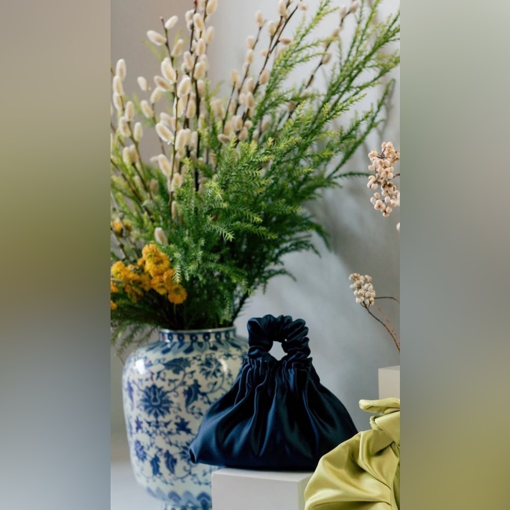 A Bronze Age Halo bag in navy